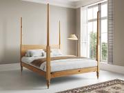 moroccan four poster wooden bed frame in honey finish by get laid beds
